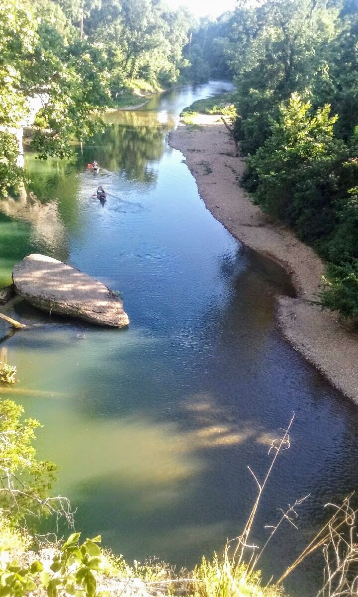 View down the river from up high with two kayaks