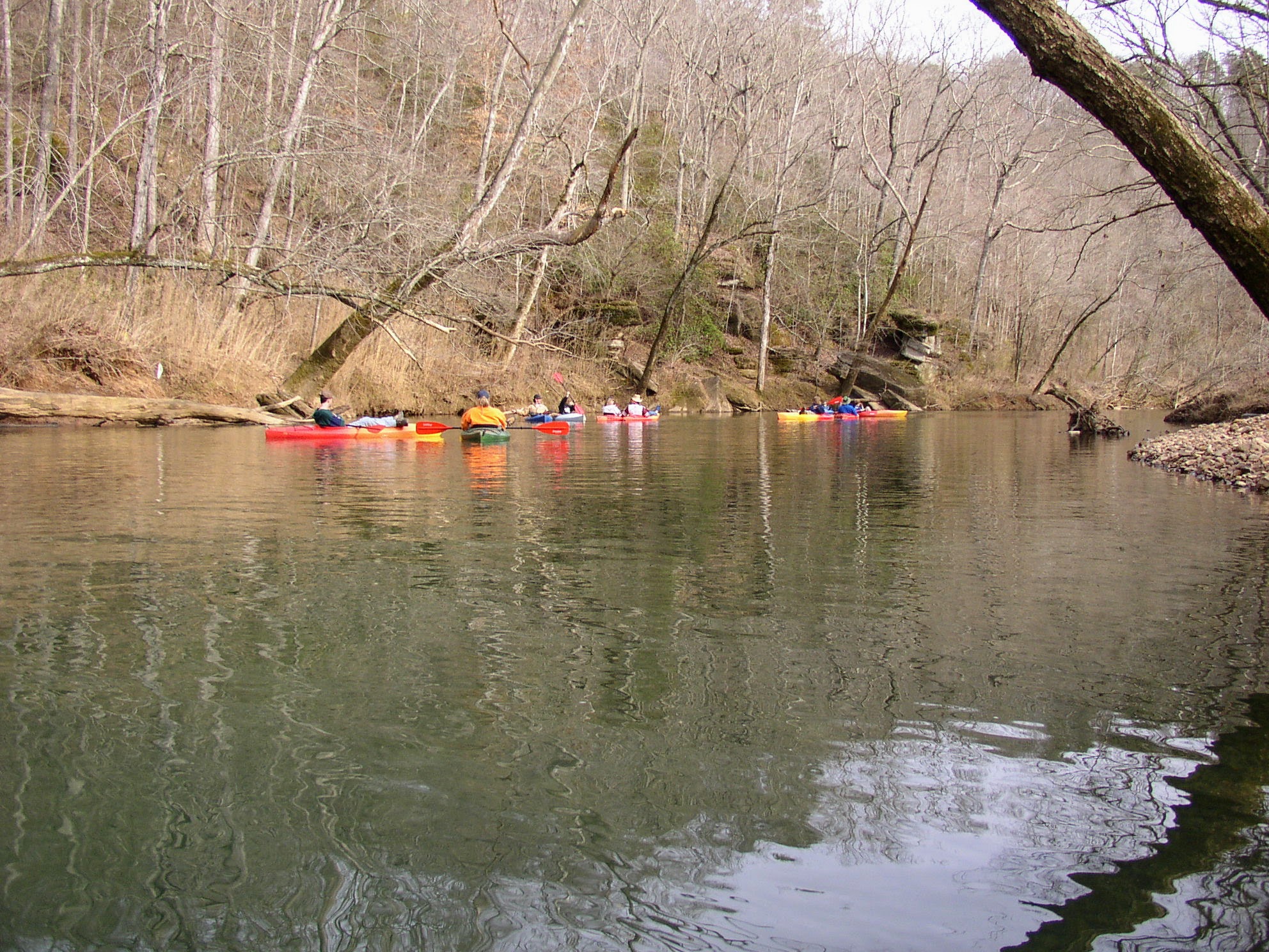 Kayaking trip down the river on a warm day in the winter