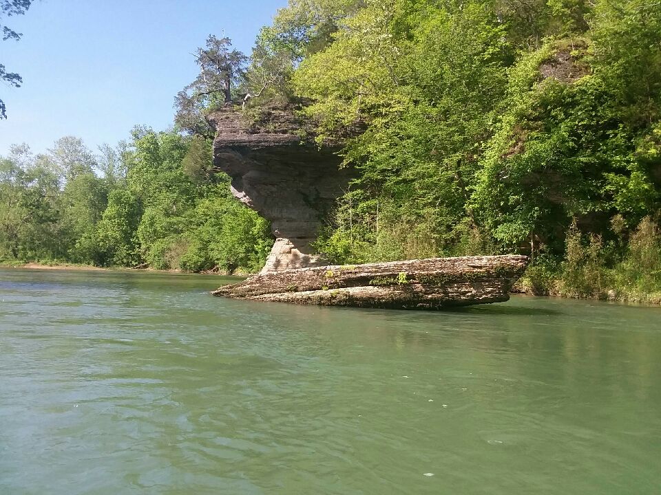 Bluff rock sticking out of the river